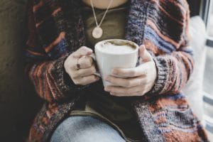 Woman holding a mug of coffee
